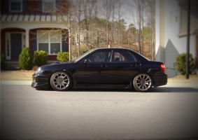 2003 Subaru Impreza WRX with 18x9 Rota G-Force wheels