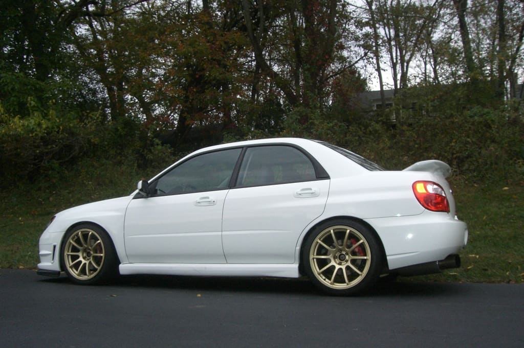 2006 Subaru Impreza WRX with 18x9 Rota G-Force wheels