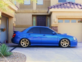 2004 Subaru Impreza WRX with 18x9.5 Rota Grid wheels