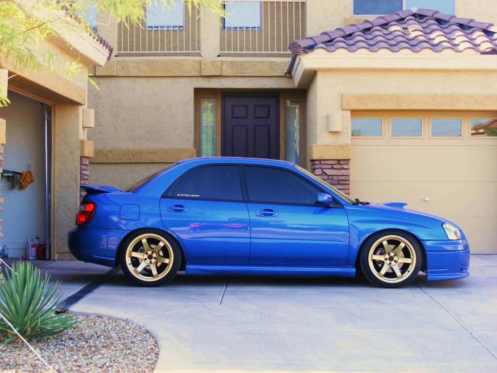 2004 Subaru Impreza WRX with 18x9.5 Rota Grid wheels