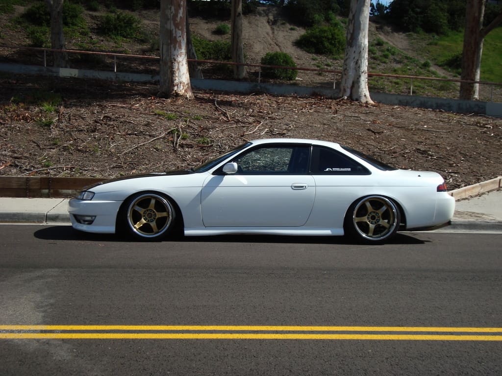 1997 Nissan S14 with 17x10 Rays Engineering Gram Lights 57Pro wheels