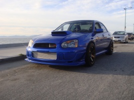 2004 Subaru Impreza WRX STi with 18x10 Rota Grid wheels