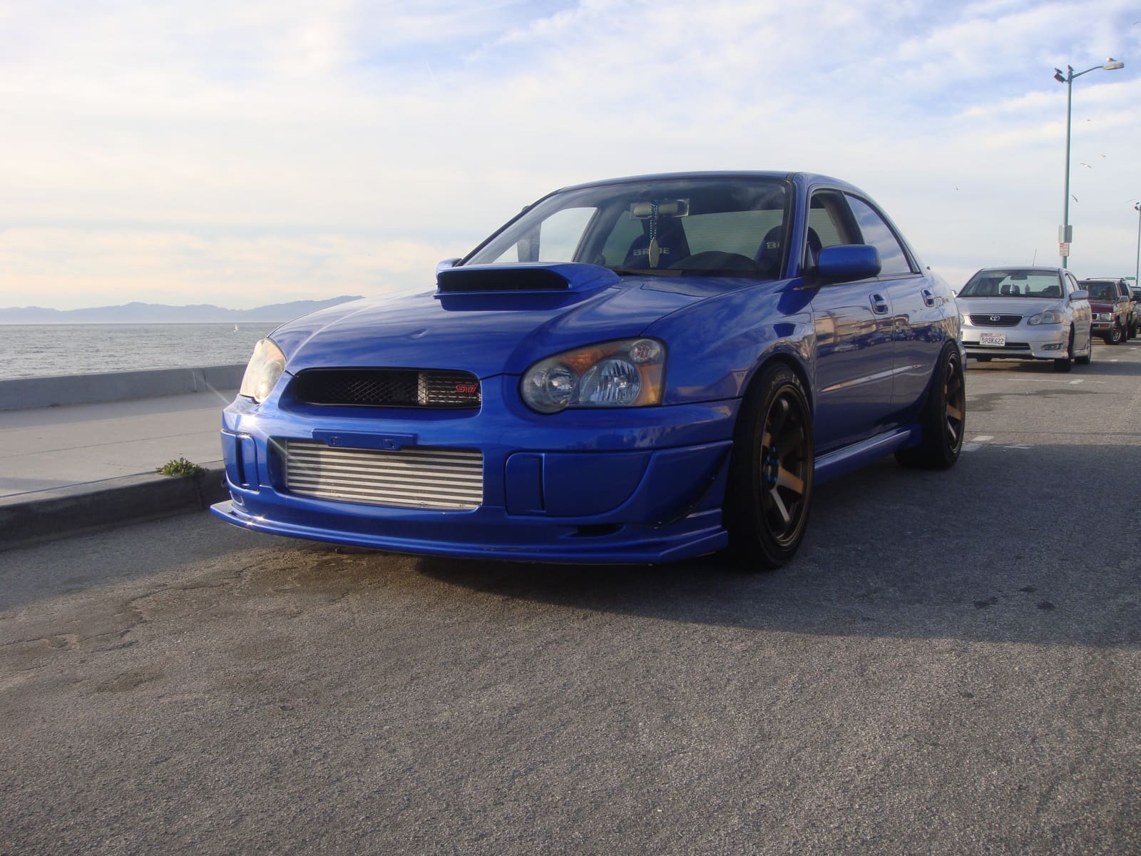2004 Subaru Impreza WRX STi with 18x10 Rota Grid wheels