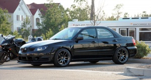 2006 Subaru Impreza with 18x9.5 Rota Torque R wheels