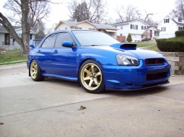 2004 Subaru Impreza WRX STi with 18x9.5 Rota Grid wheels