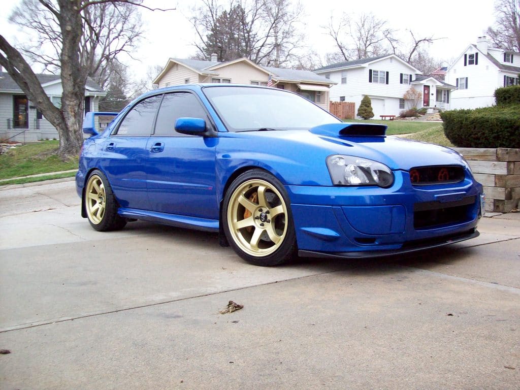 2004 Subaru Impreza WRX STi with 18x9.5 Rota Grid wheels