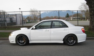 2004 Subaru Impreza WRX STi with 18x9.5 Rota Torque R wheels