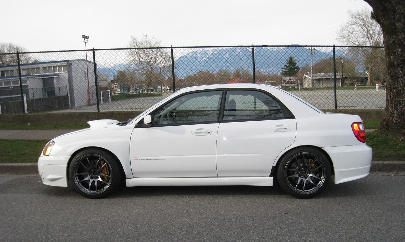 2004 Subaru Impreza WRX STi with 18x9.5 Rota Torque R wheels
