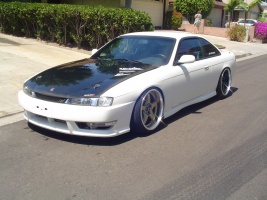 1997 Nissan S14 with 18x10 Rays Engineering Gram Lights 57Pro wheels