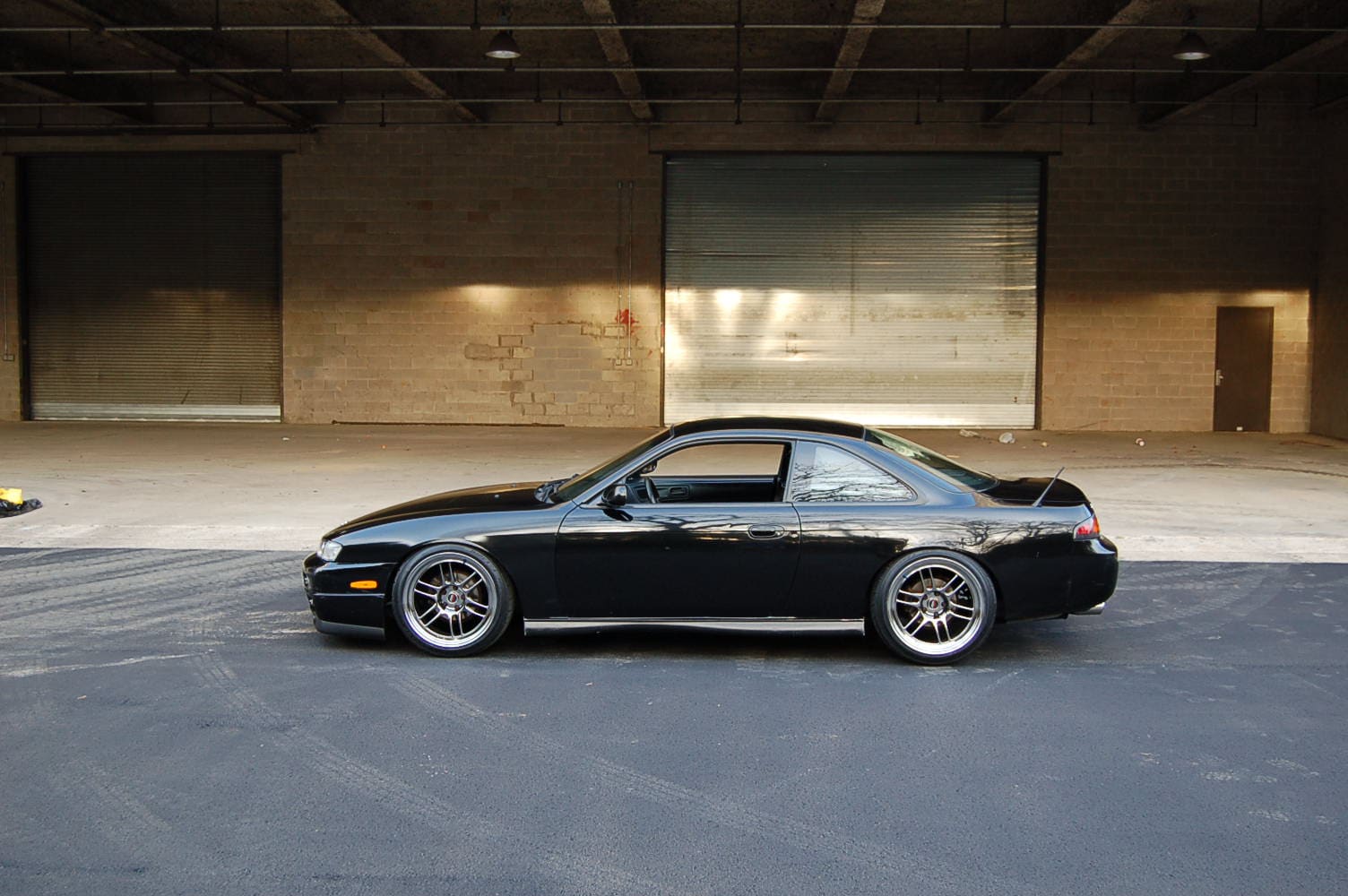 1998 Nissan S14 with 18x9.5 Enkei RPF1 wheels