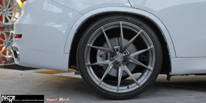 2014 BMW X5 with 22x10 Niche Misano wheels