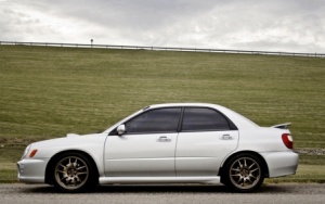 2002 Subaru Impreza WRX with 17x8 Rota Torque wheels