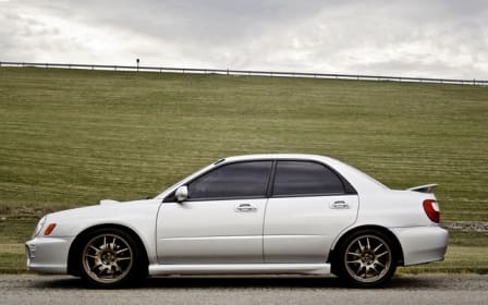2002 Subaru Impreza WRX with 17x8 Rota Torque wheels