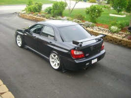 2002 Subaru Impreza WRX with 18x9.5 Rota Grid wheels