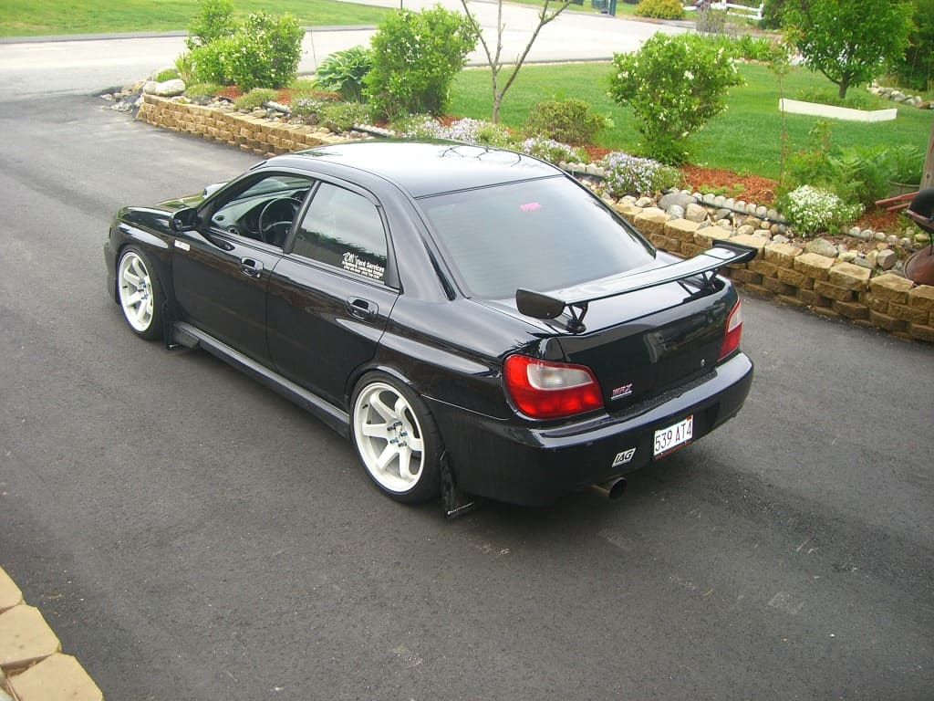 2002 Subaru Impreza WRX with 18x9.5 Rota Grid wheels