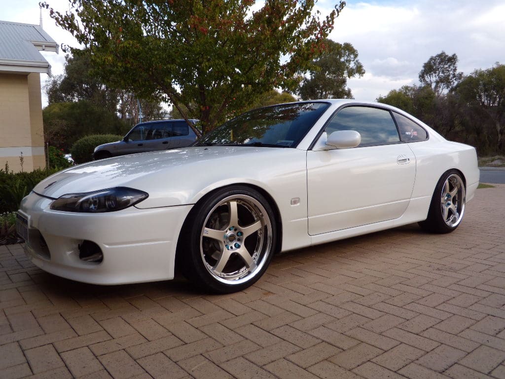 1999 Nissan S15 with 18x9 Volk Racing GramLights 57F Pro wheels