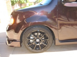 2009 Nissan Cube with 17x7 Enkei EDR9 wheels