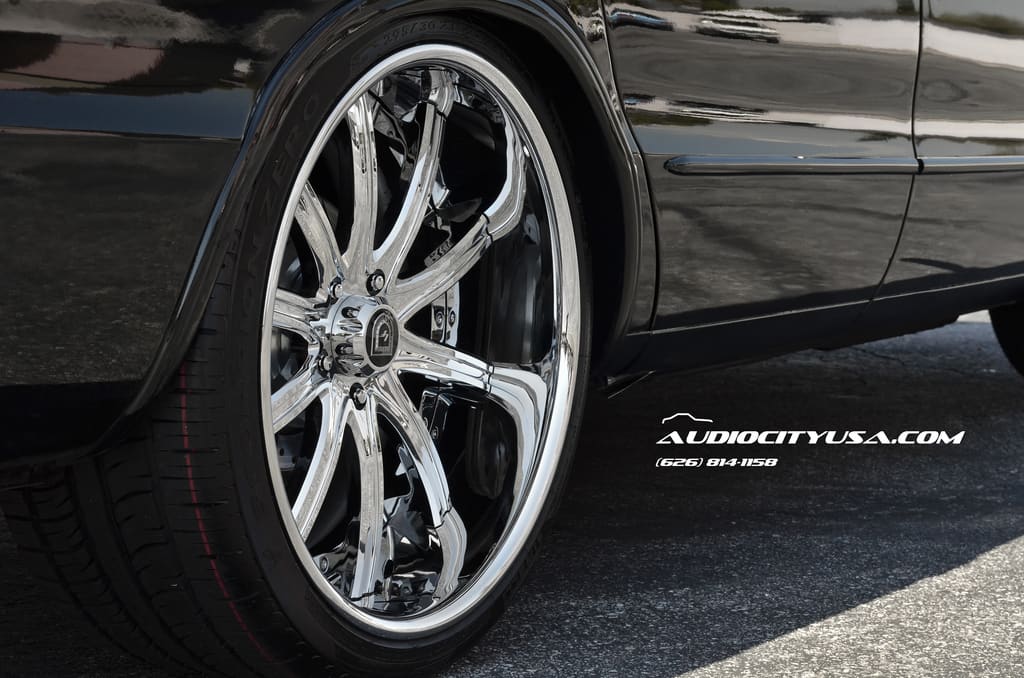 2000 Chevrolet Impala with 22x9.5 Lexani LS-709 wheels