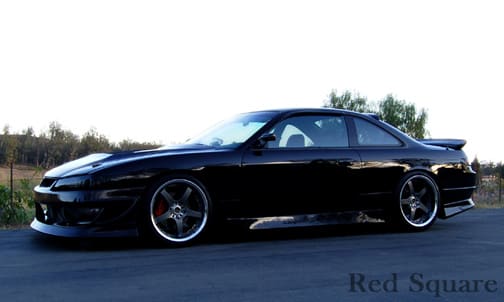 1998 Nissan S14 with 18x9 Gram Lights 57F-pro wheels