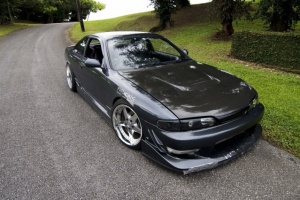 1993 Nissan S14 with 18x10 Work Equips wheels