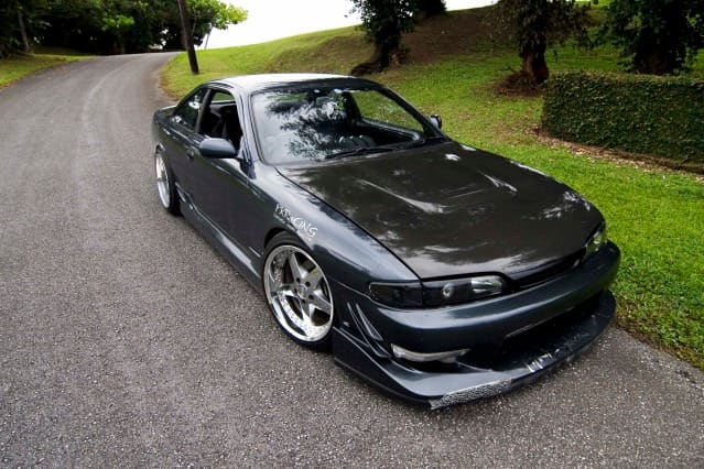 1993 Nissan S14 with 18x10 Work Equips wheels