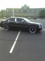2012 Chrysler 300 with 24x10 Dvinci Tuscani wheels