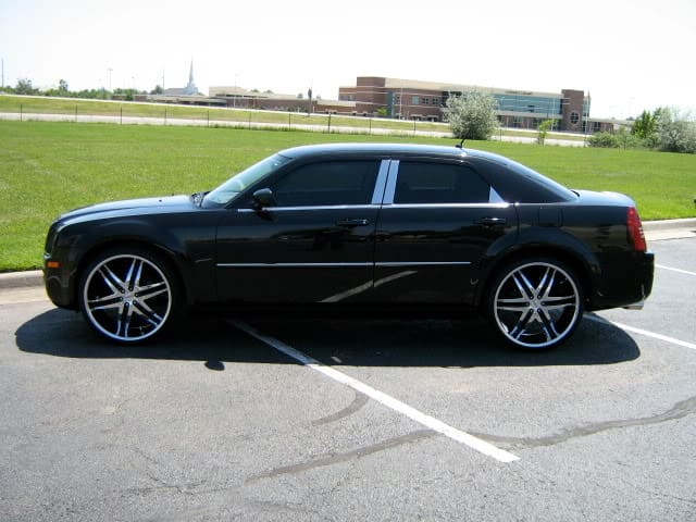 2010 Chrysler 300 with 24x10 MOZ Shine wheels