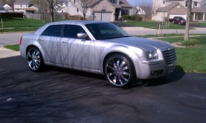 2006 Chrysler 300 with 24x9.5 Red Sport 11 wheels