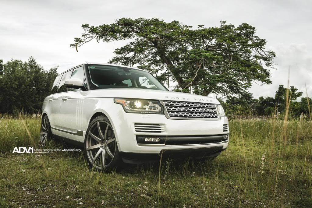 2014 Land Rover Range Rover with 23x10.5 ADV 08.1 wheels