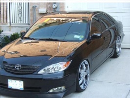 2002 Toyota Camry with 20x8.5 paladin cognac wheels