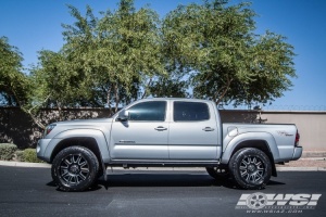 2011 Toyota Tacoma with Black Rhino Armour wheels