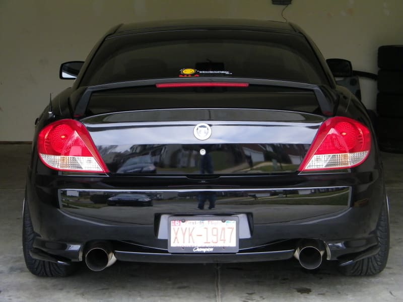 2006 Hyundai Tiburon with 18x9 Rota G force wheels